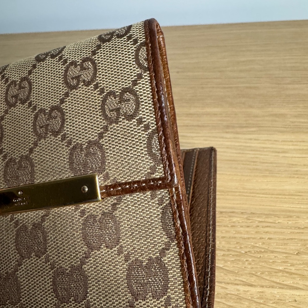 Authentic Gucci Brown monogram bifold wallet - Picture 15 of 16